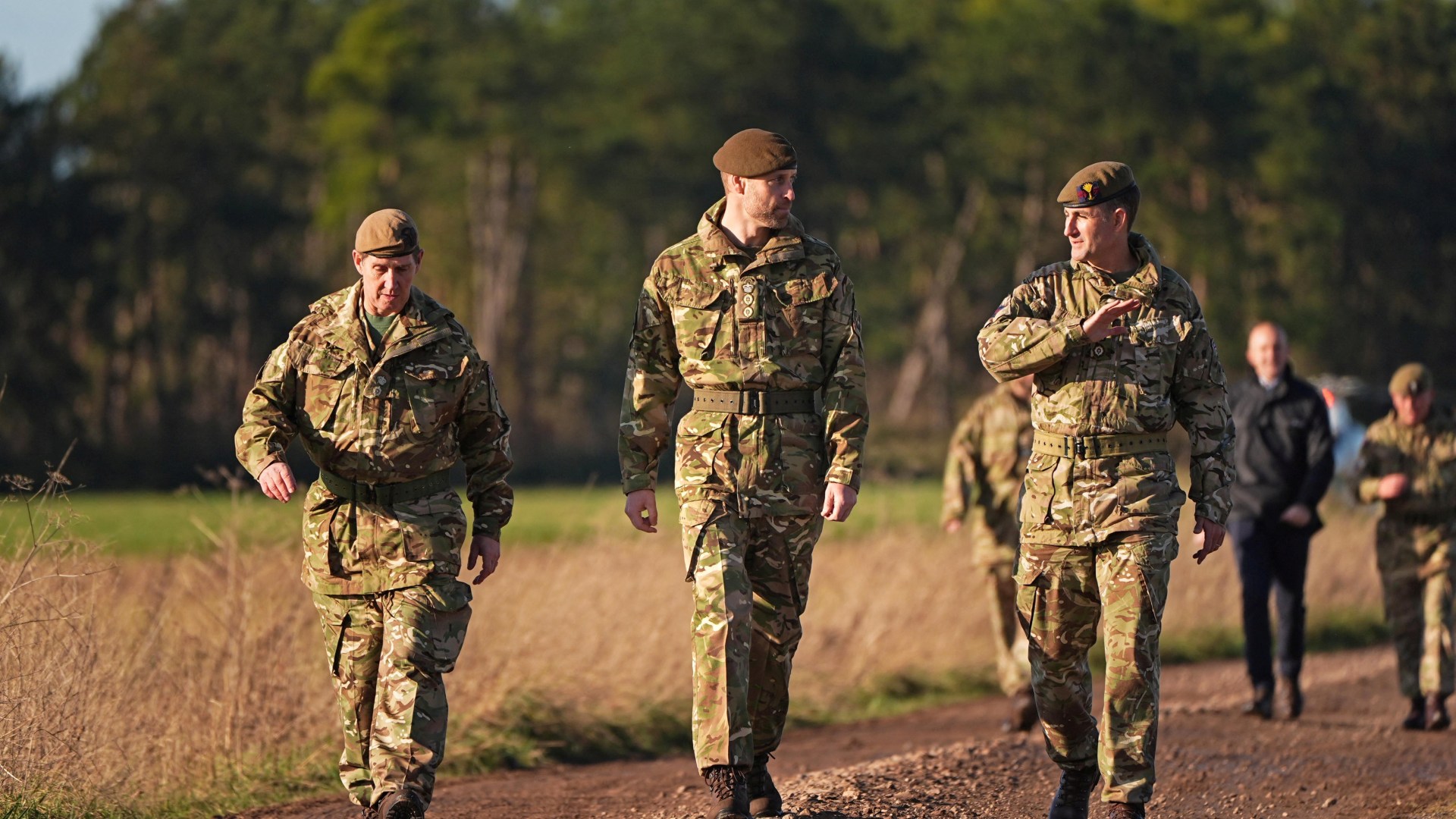 Watch camo-clad Prince William shoot sniper rifle on gun range and fly drone in visit to Salisbury Plain