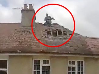 Shocking moment dad hurls roof tiles at neighbours leaving one in tears 'in bid to systematically destroy their home'