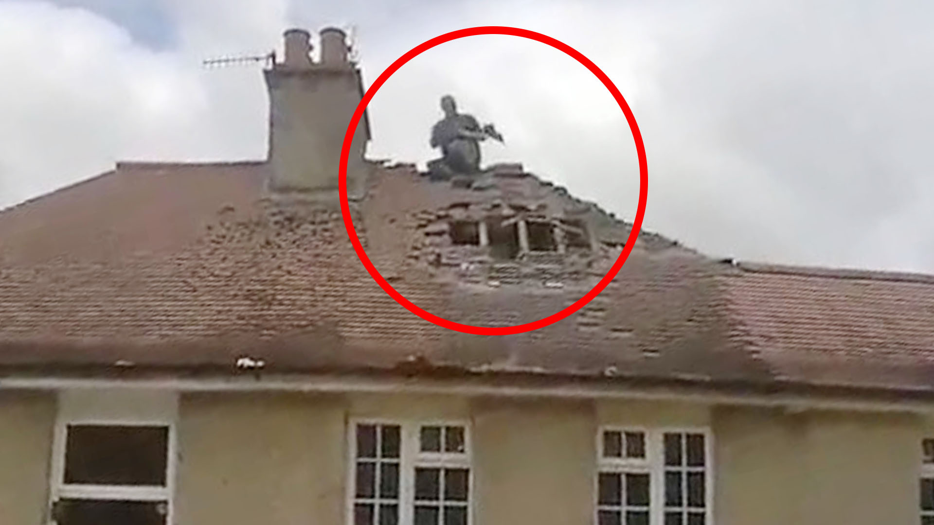 Shocking moment dad hurls roof tiles at neighbours leaving one in tears 'in bid to systematically destroy their home'