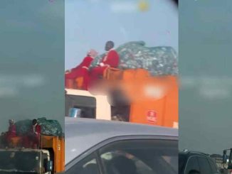 A motorist is stúnned after spotting men in Santa Claus costumes sitting a on waste truck in Lagos (WATCH)