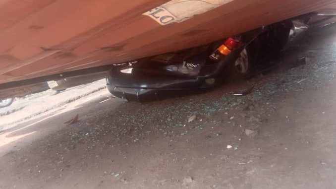 Couple Escapes Death As Container Falls On Stationary Car