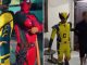 Bizarre moment cops dressed as Wolverine and Deadpool bust drug gang as they raid building & march suspects down street