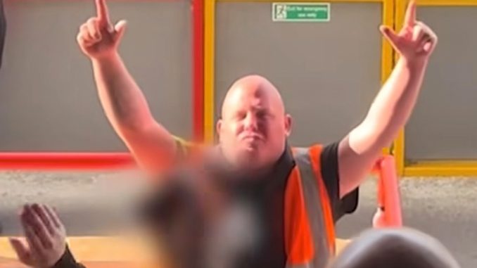 Brilliant moment steward who's the spitting image of darts legend is serenaded by football fans