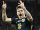 Buzzing Ben Doak reacts after hearing Scotland chant as Tartan Army embrace new hero with tune in Poland