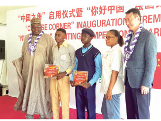 Chinese Ambassador to Nigeria, Yu Dunhai(Fifth from Right) with award winning students and officials of the FCT  Secondary Education Board