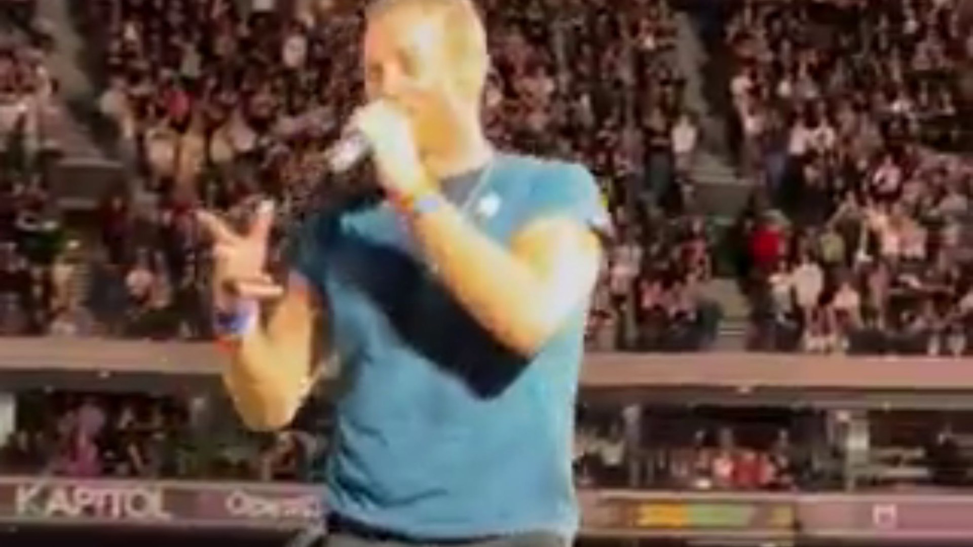 Coldplay fans gasp in shock as Chris Martin takes a nasty fall into open trap door during huge stadium gig