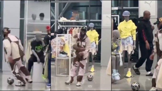 Davido spotted playing football in a clothing store in U.S.