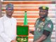 R-L: Chief of Defence Staff, General Christopher Musa, presenting gift to chairman, National Sports Commission, Shehu Dikko during a visit to the Defence Headquarters in Abuja, yesterday.