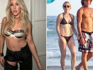 Ellie Goulding stuns as she strips to bra and tiny leather shorts and chaps after split from toyboy