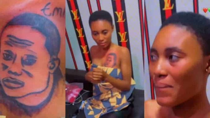 Lady tattoos boyfriend's face on her chest to prove her love