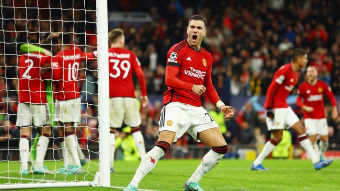 Soccer Football - Champions League - Group A - Manchester United v FC Copenhagen - Old Trafford, Manchester, Britain - October 24, 2023 Manchester United's Diogo Dalot celebrates after Andre Onana saved a penalty missed by FC Copenhagen's Jordan Larsson REUTERS/Molly Darlington