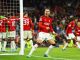 Soccer Football - Champions League - Group A - Manchester United v FC Copenhagen - Old Trafford, Manchester, Britain - October 24, 2023 Manchester United's Diogo Dalot celebrates after Andre Onana saved a penalty missed by FC Copenhagen's Jordan Larsson REUTERS/Molly Darlington