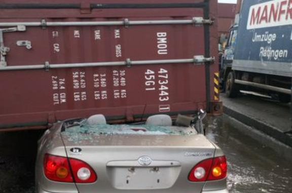 Man rescued unscathed as 40ft container crushes car in Lagos