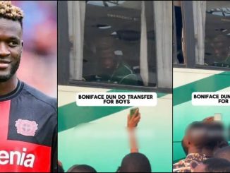 Moment Boniface transfers cash to fan while on team bus