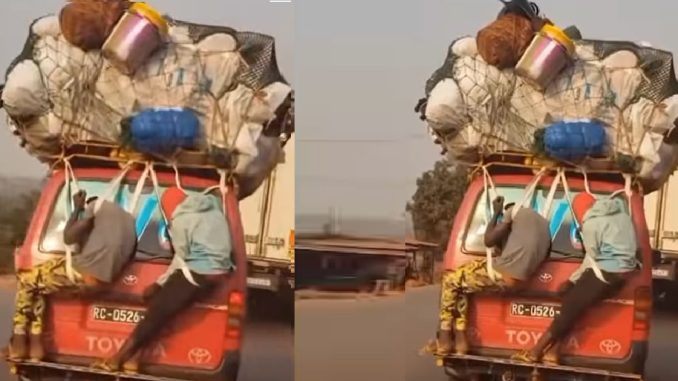 "Na like this I dey go village for Christmas" – Video of men "waybilled" to the back of a moving bus trends (WATCH)