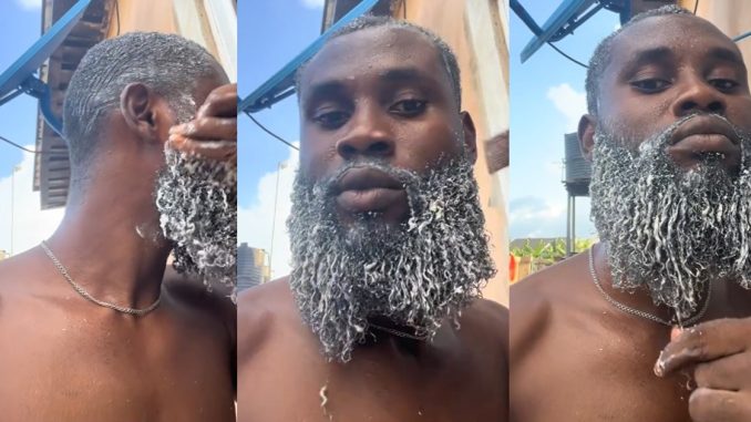 Nigerian man prepares for Father Christmas duty, relaxes beard for December (VIDEO)