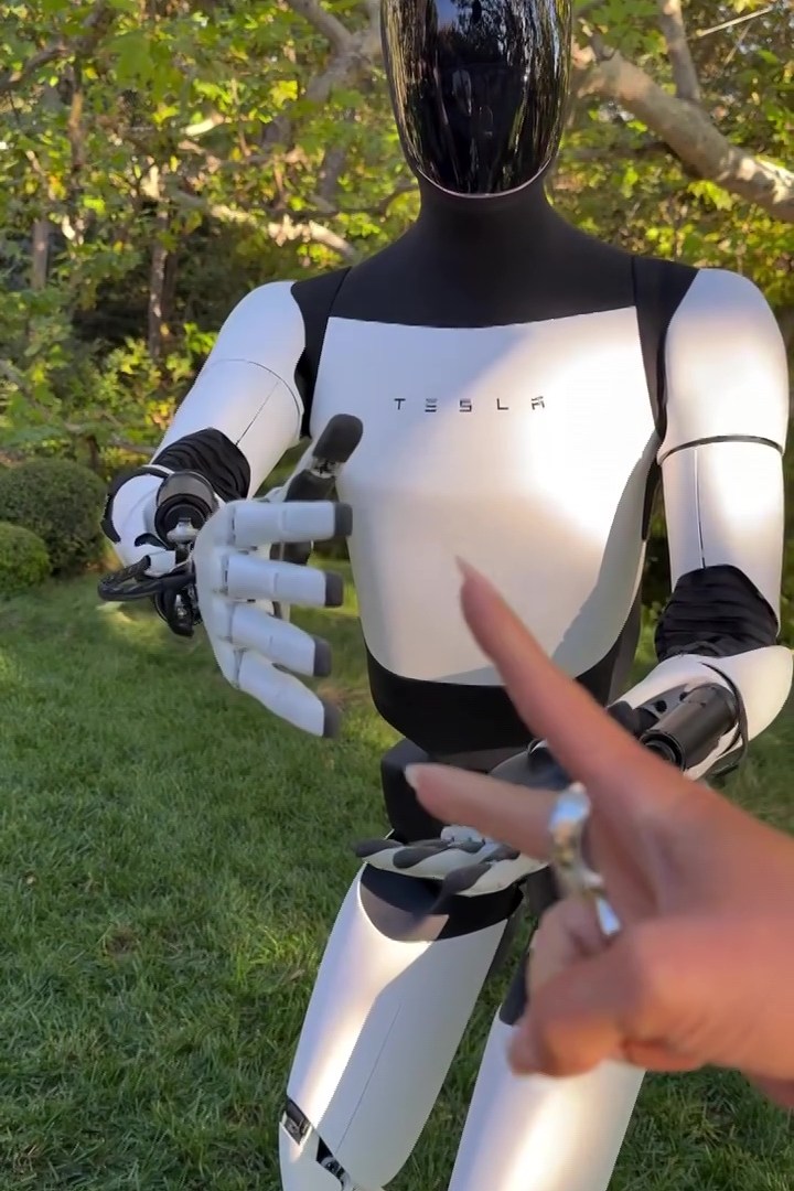 Watch Kim Kardashian beat Tesla Optimus at rock-paper-scissors & let it drive Cybercab as she’s FIRST to receive bot