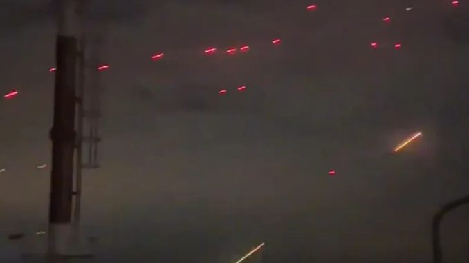 Watch heart-stopping moment Ukrainian anti-air guns light up the sky blasting Russian drone swarm attacking Odesa