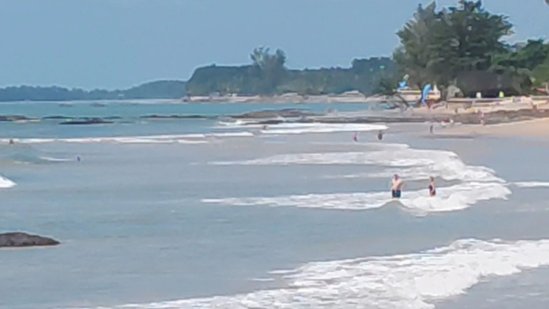 Tourist, 57,  mauled in bloody shark attack in front of horrified beachgoers as beast takes bite out of leg in Thailand