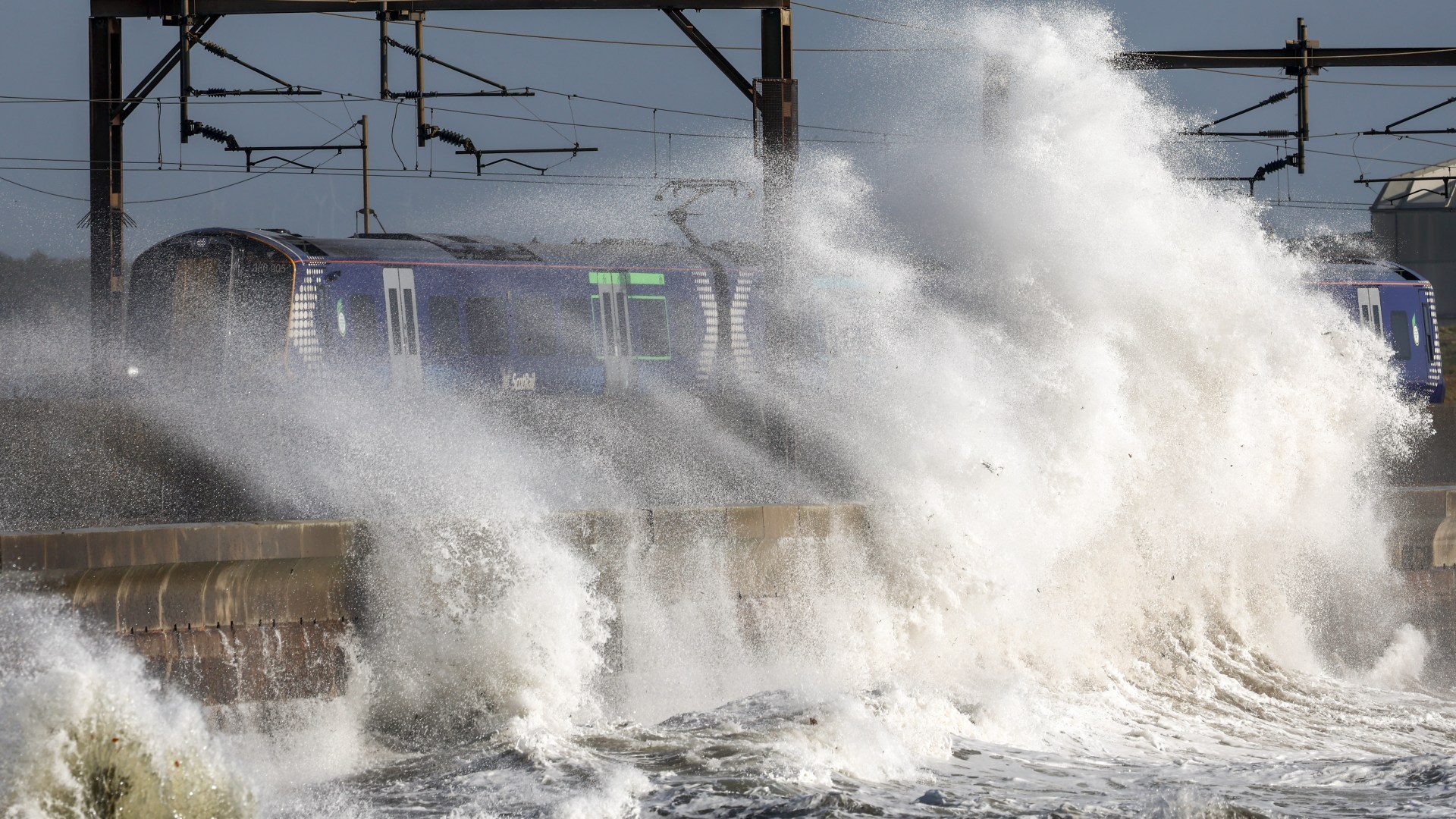 Snow flurries blanket Scotland as map shows Met Office warning zone & 75mph storm looms