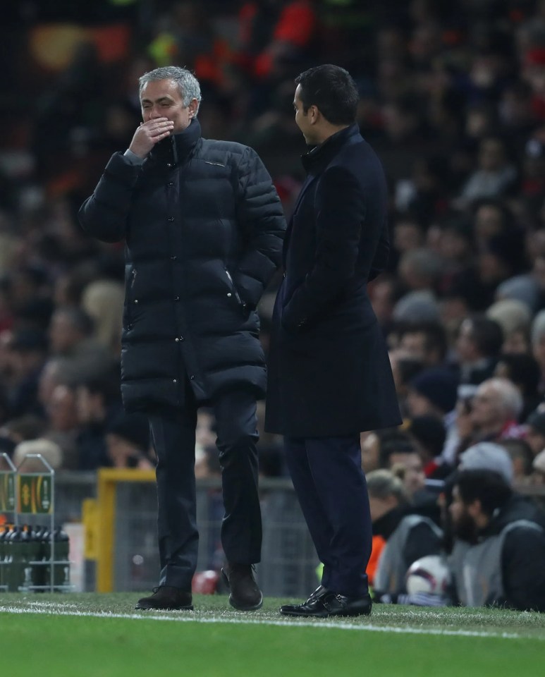 Mourinho and Van Bronckhorst on the touchline together