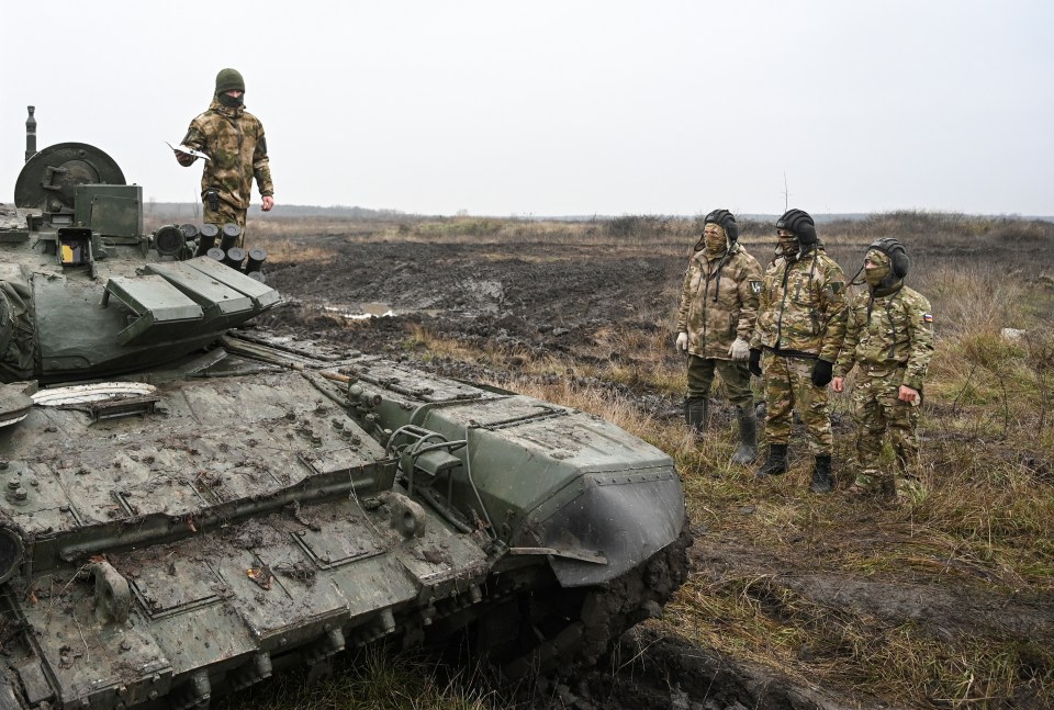 Russian contract soldiers line up for training training before they are sent to the frontline