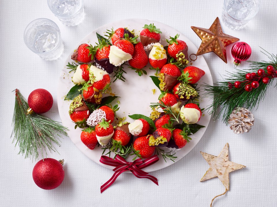 A strawberry wreath is a yummy festive dessert to celebrate the fruit