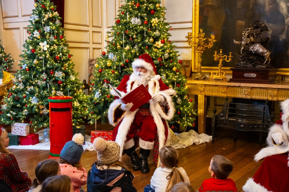 Children treasure gifts from Santa Claus