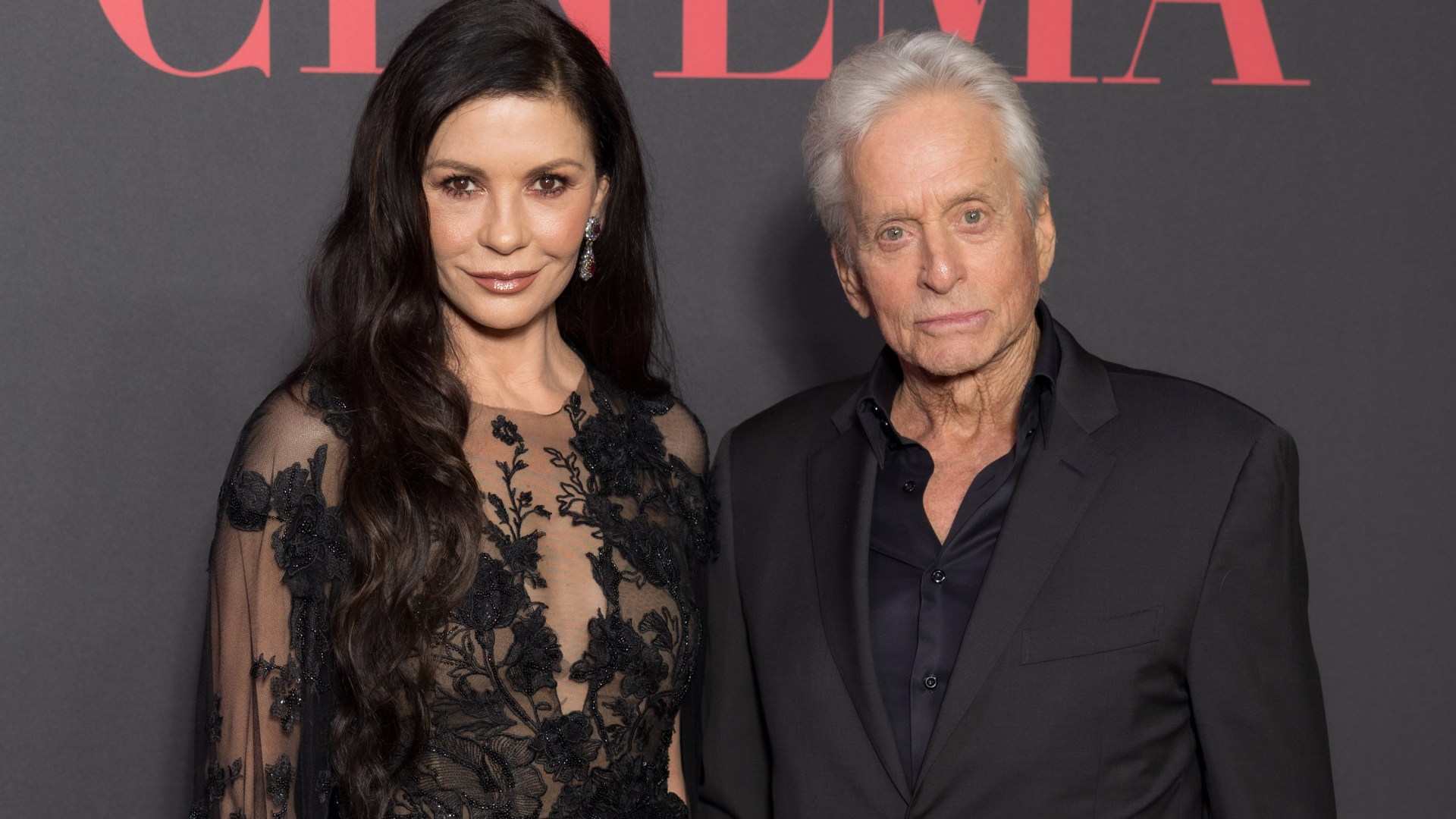 Catherine Zeta Jones, 55, has barely aged in sheer lace dress on the red carpet with husband Michael Douglas, 80