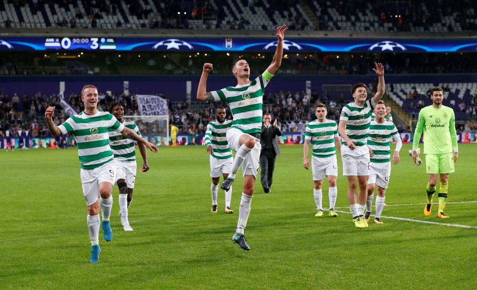 His ex-players celebrating the famous away win in Belgium in 2017