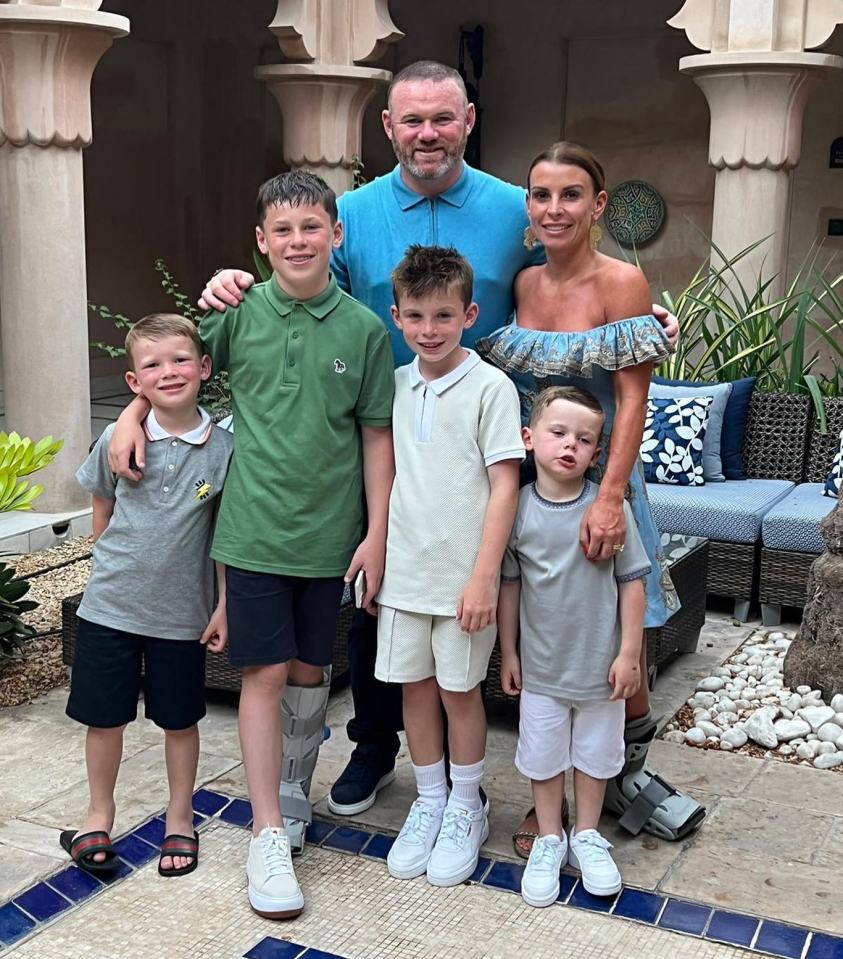 Wayne, pictured here with Coleen and their four sons Kai, Klay, Kit and Cass - made sure his wife knew how proud he was of her on the phone