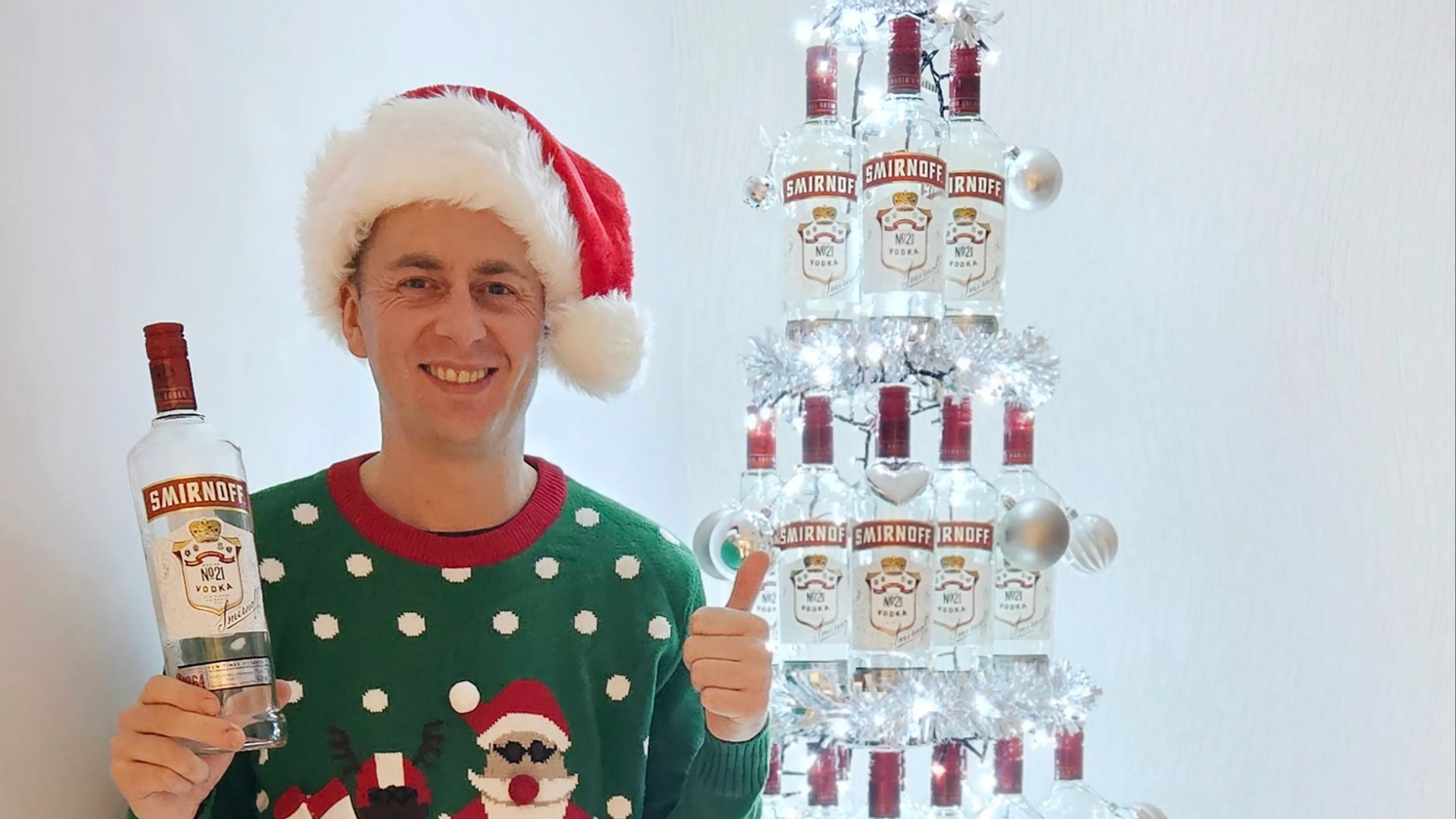 Dad gets into the spirit of Christmas — by making a 7ft tree out of vodka bottles