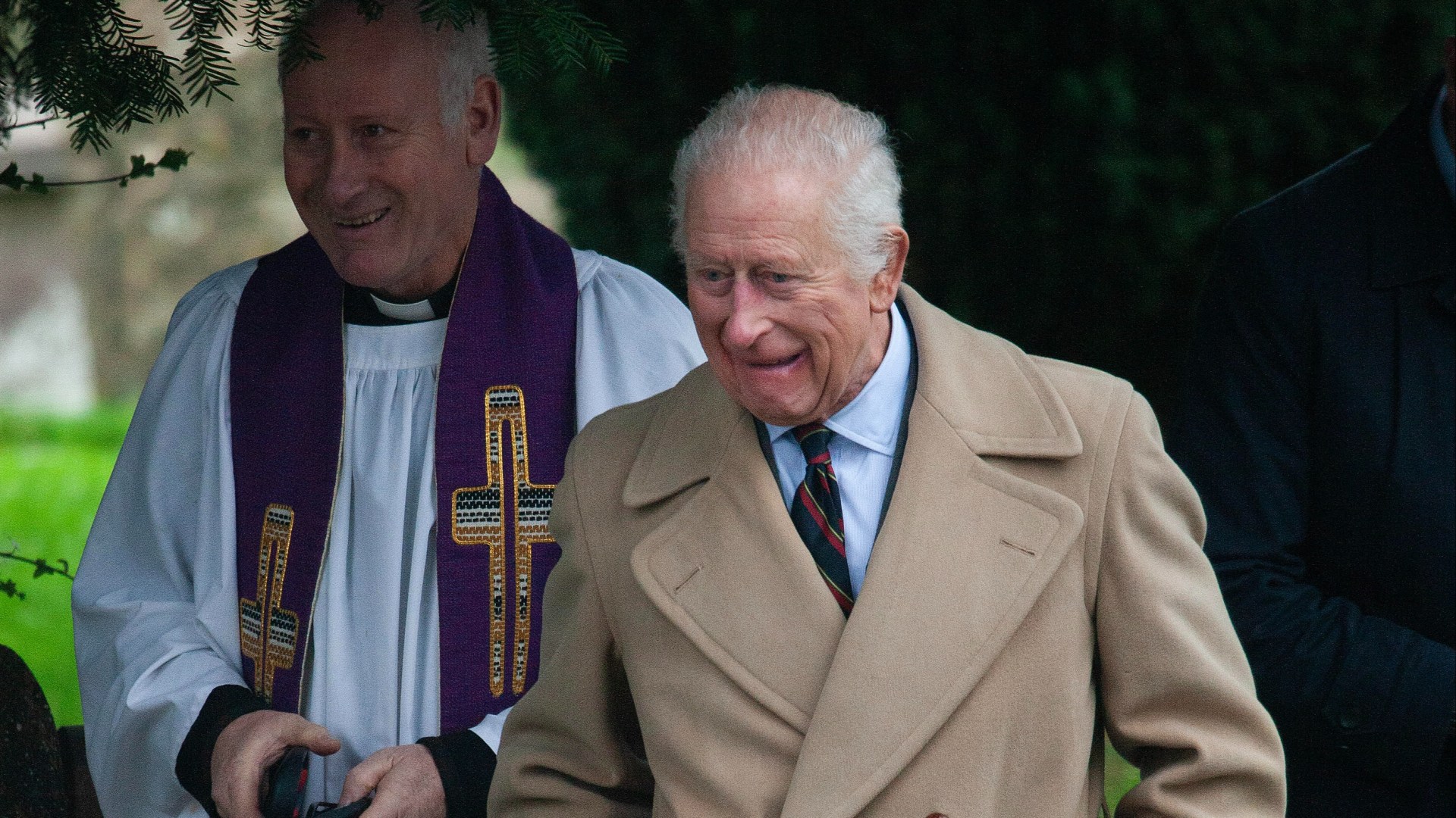 King Charles is all smiles at church as he brushes off Prince Andrew's 'Chinese spy' scandal