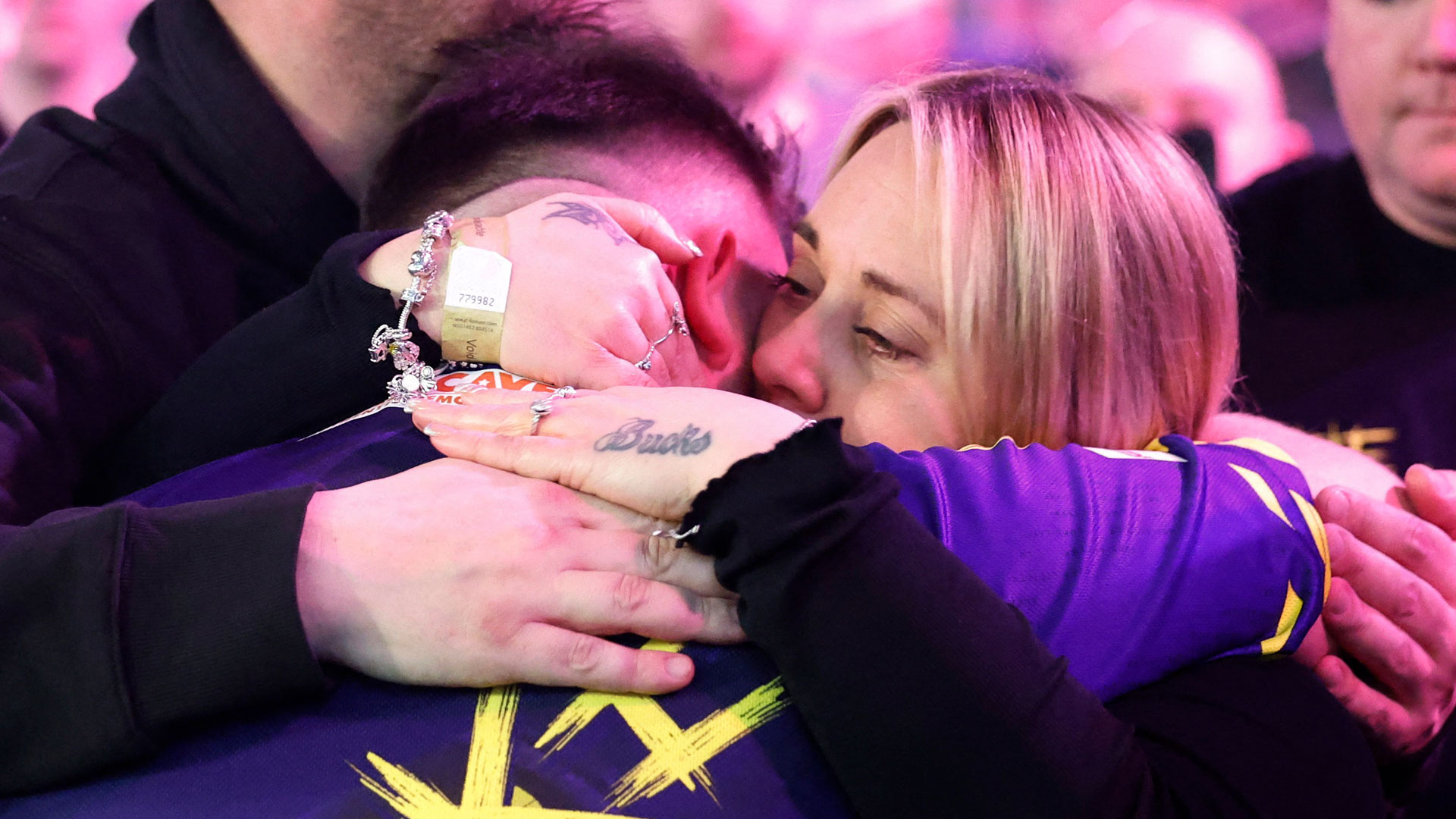 Emotional moment tearful Luke Littler, 17, breaks down in his parents' arms after cutting interview short at darts