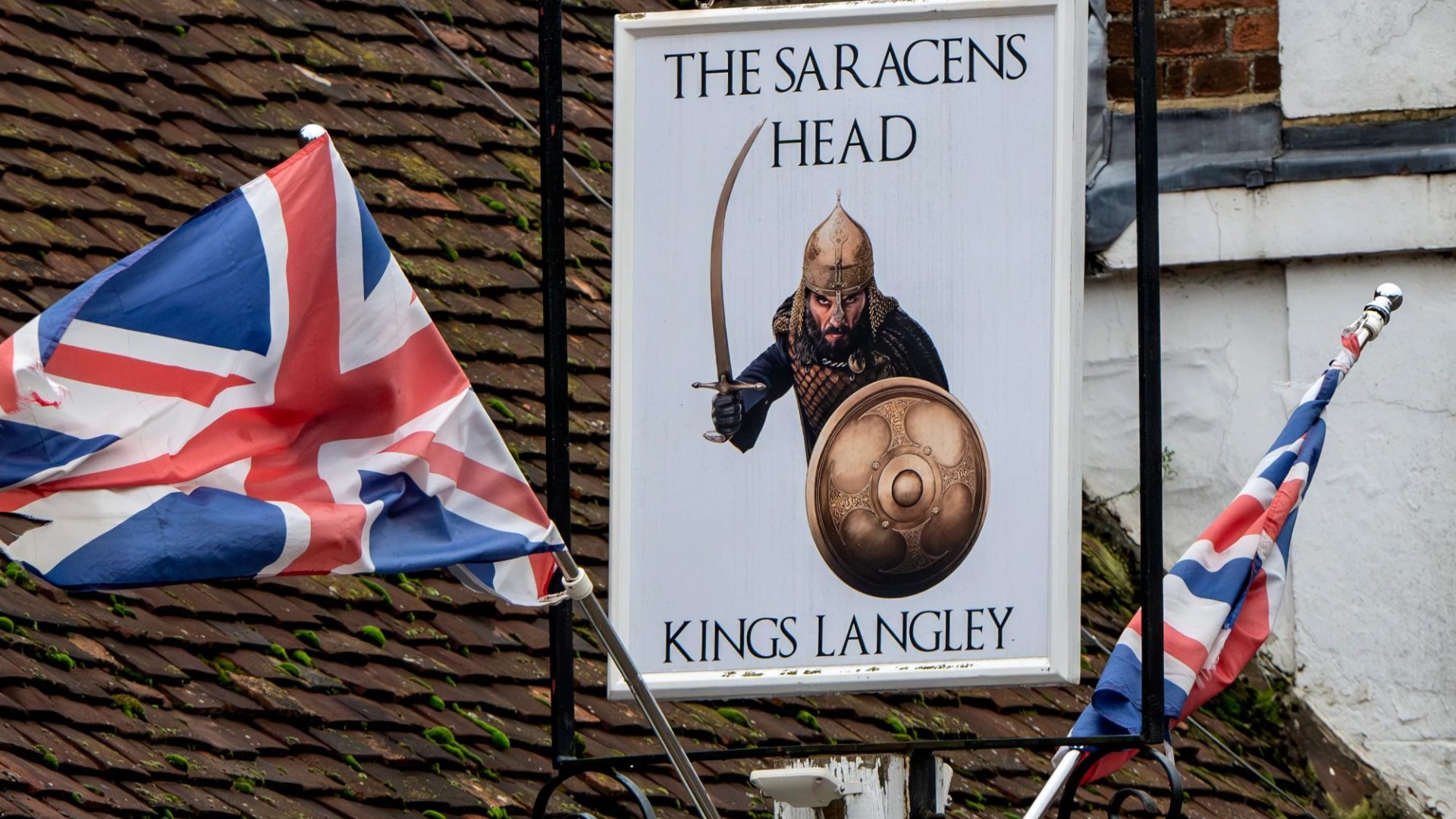 Fury as convicted terrorist threatens to sue two more Saracen's Head landlords over their 'racist' pub signs