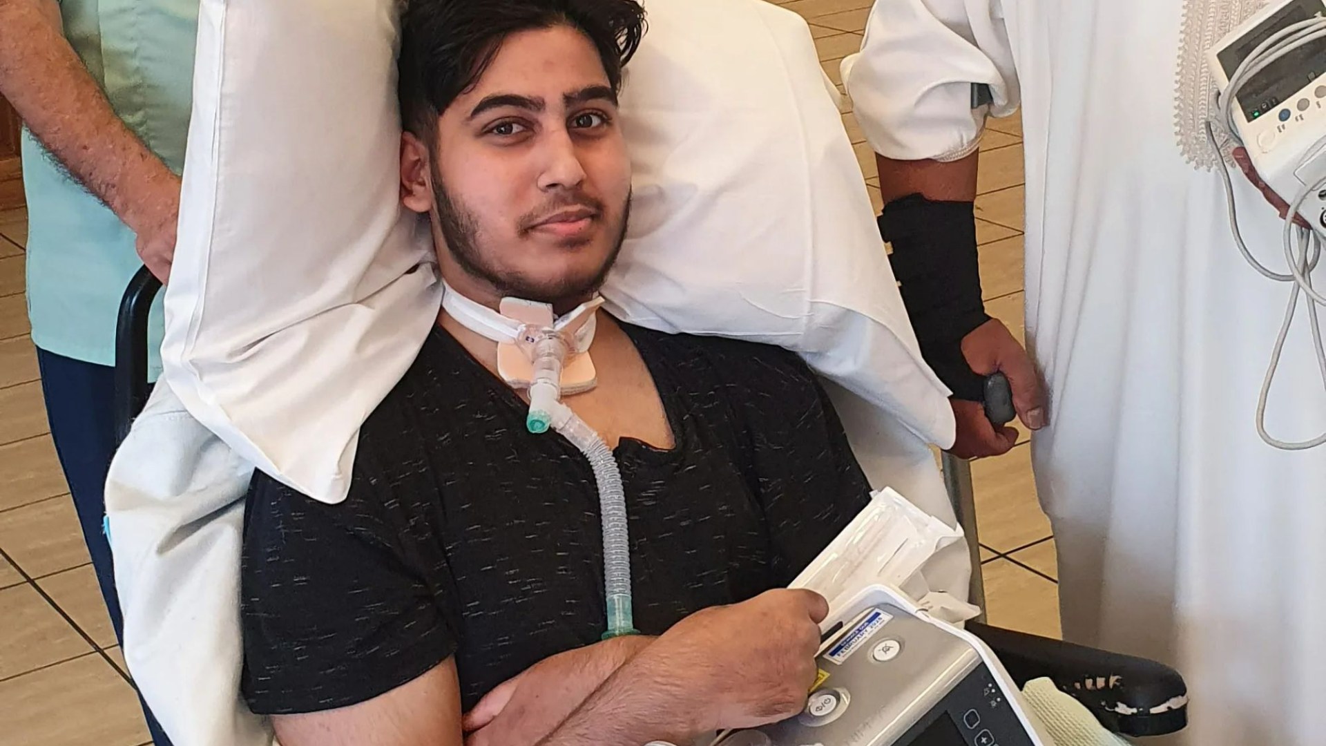 My 15-year-old son felt a sharp pain in his stomach...24 hours later he was paralysed from the neck down