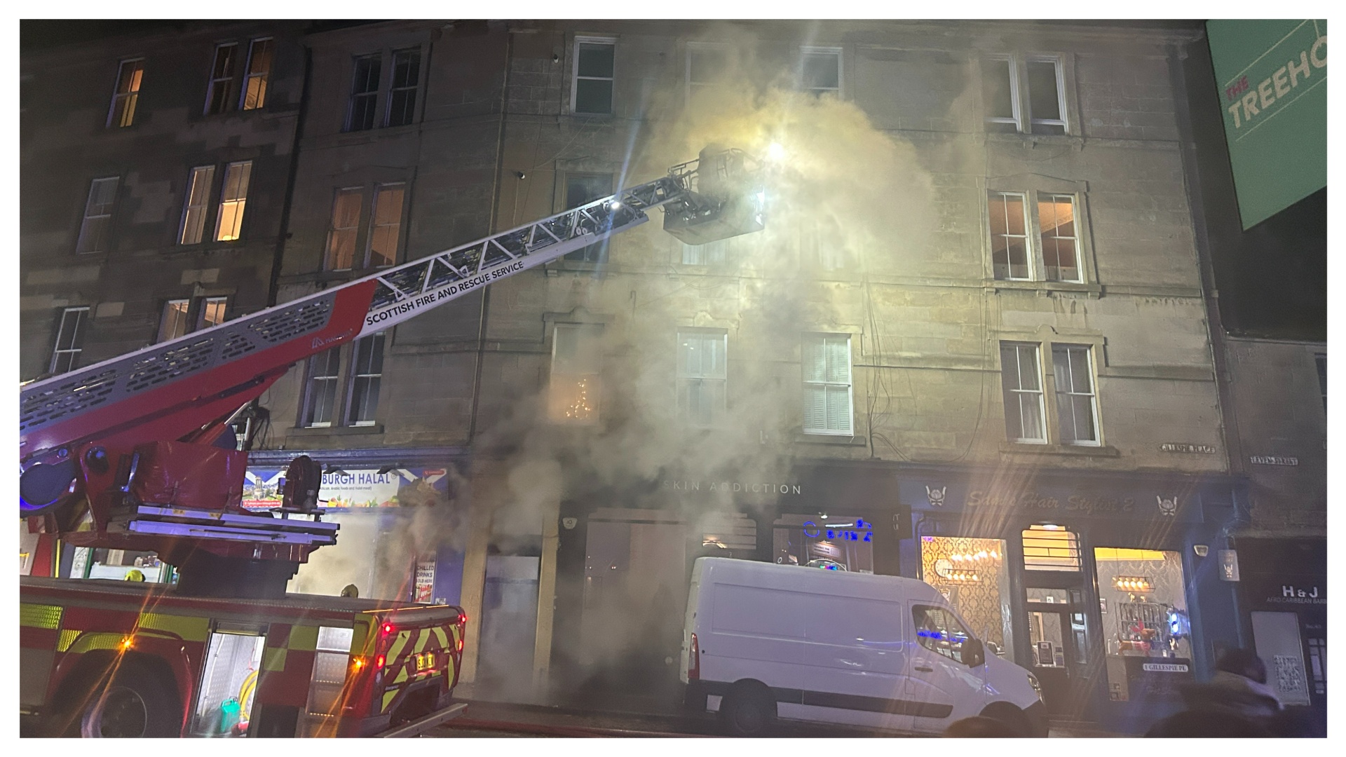 Blaze engulfs Scots shop as fire crews scramble to scene and flats evacuated