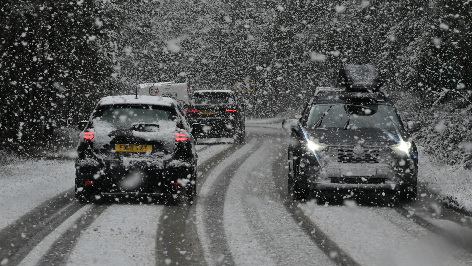 Blizzards, 60mph winds & up to 8 INCHES of snow to batter Britain over New Year - after dozens of flights cancelled