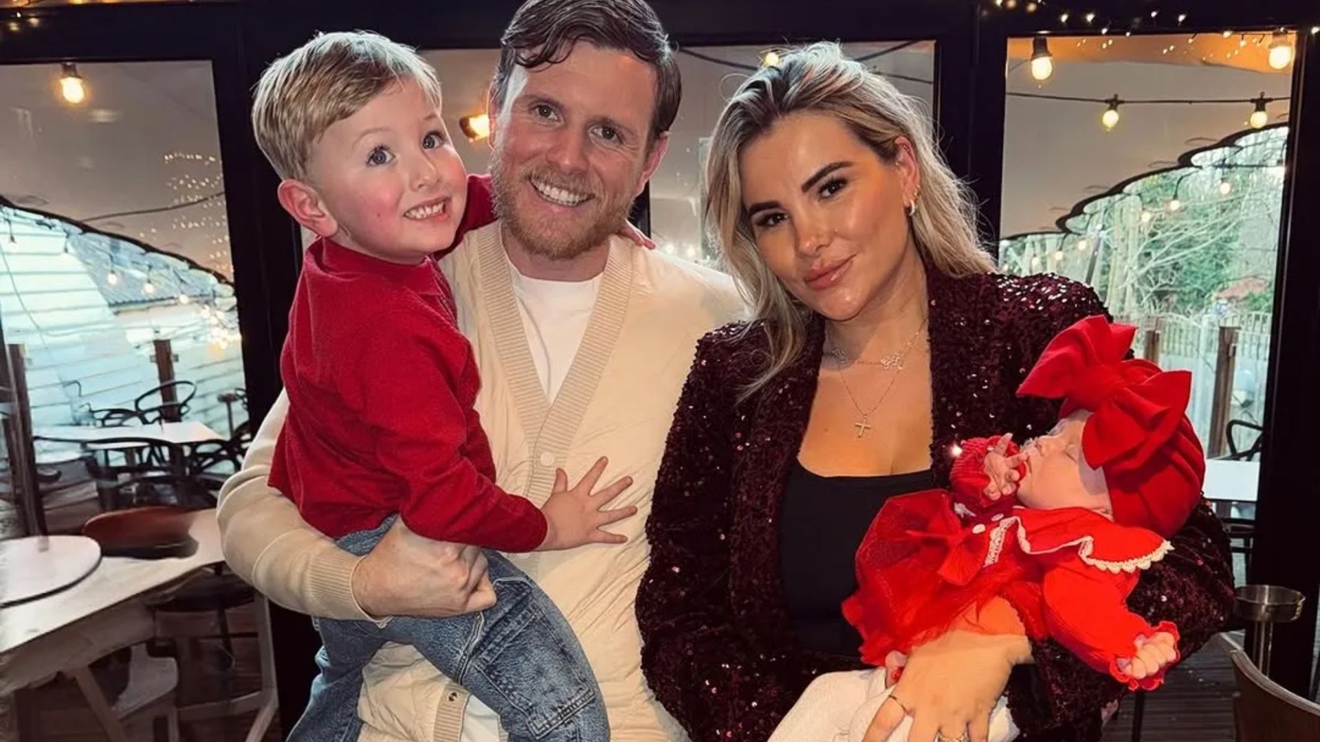 Georgia Kousoulou and Tommy Mallet enjoy first Xmas as a four in sweet photo after daughter's hospital dash