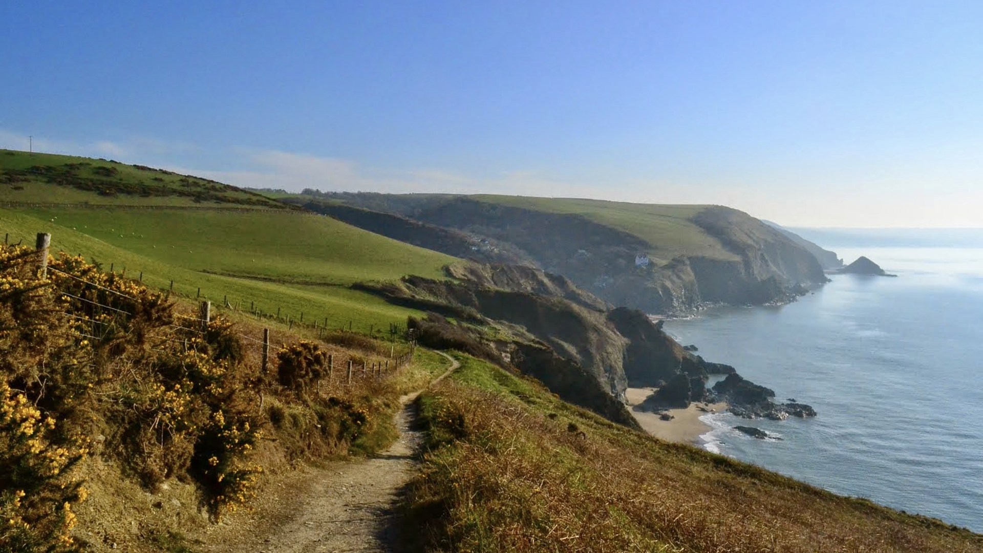 Little-known pink beaches and turquoise lagoons that you won't believe are in Wales