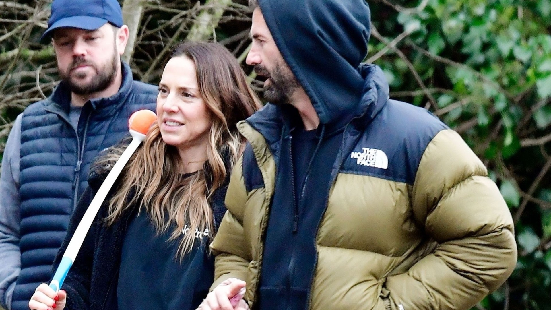 Mel C looks loved up on romantic Christmas walk with model boyfriend Chris Dingwall - as pair wear matching rings