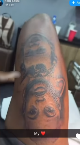 Tobi Bakre tattoos his kids' faces on his leg