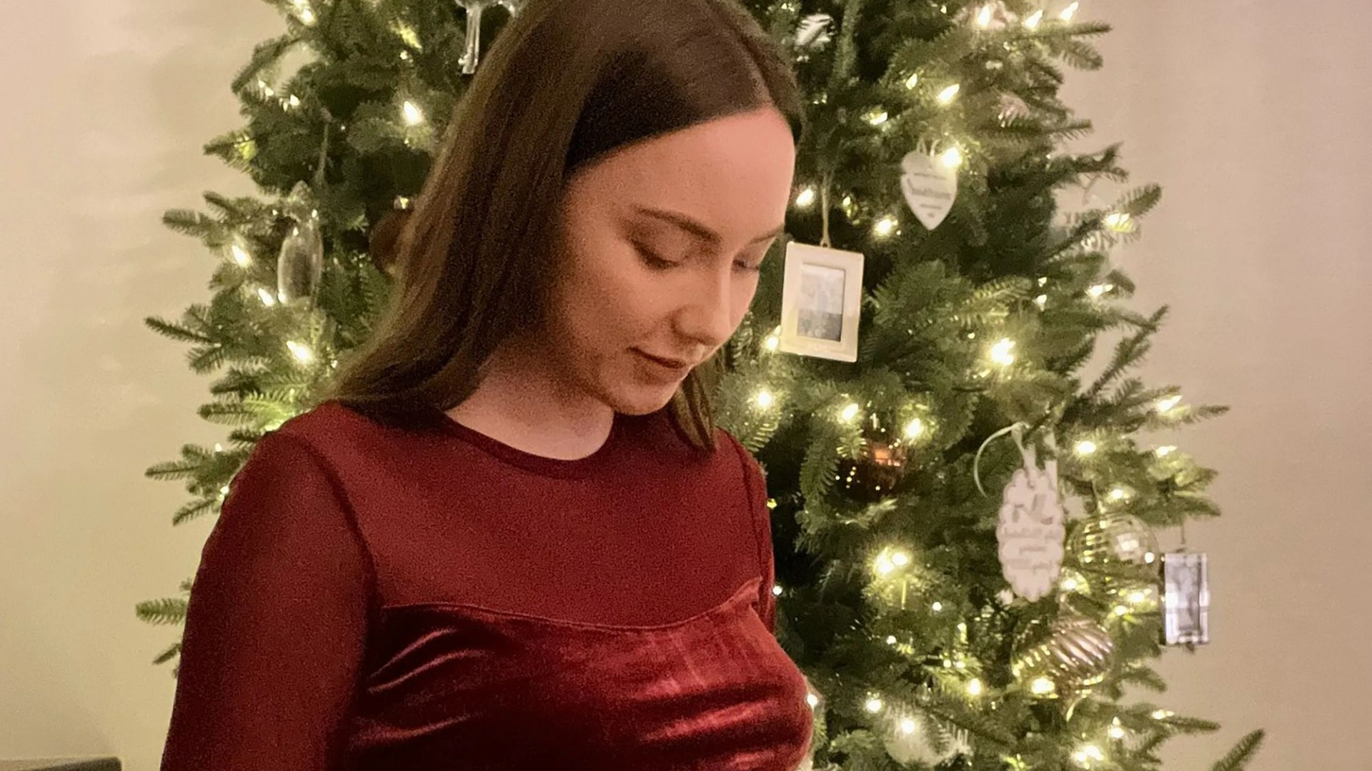 Eminem's pregnant daughter Hailie Jade shows off her bare baby bump in festive crop top