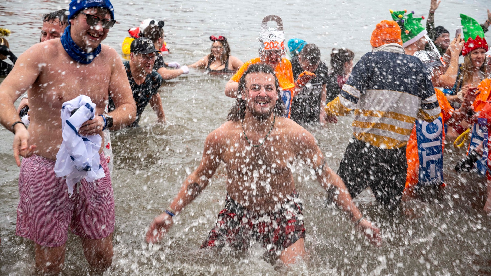 Hundreds of hardy Scots brave the icy water throughout the country during annual New Year’s Day Loony Dook