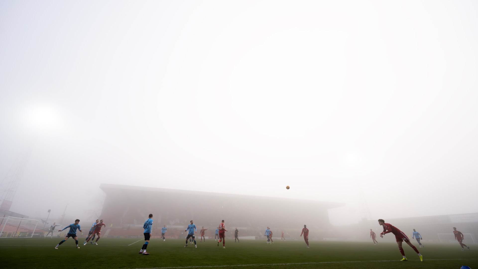 'This isn't restarting is it...' moan fans as EFL clash SUSPENDED for an hour as heavy fogs smothers pitch